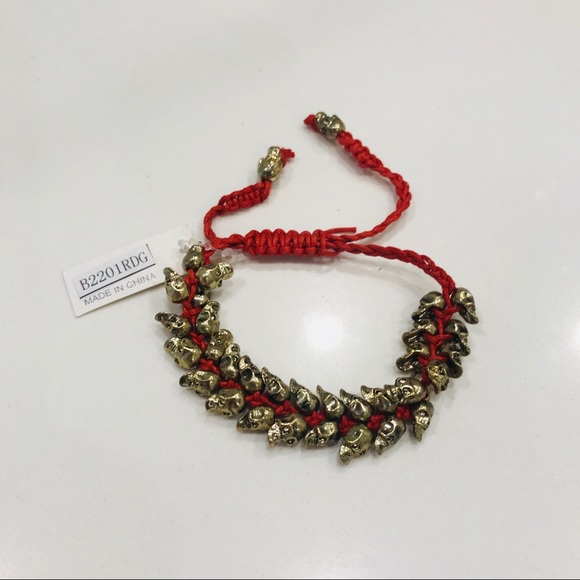 NWT bracelet, multiple bronze skulls & red thread - Picture 4 of 8